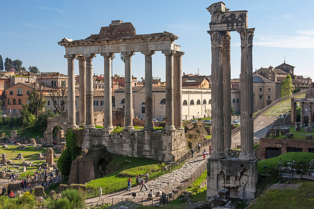 Ancient Roman Road traverses the columns and ruins in the Forum of Ancient Rome, UNESCO World Heritage Site, Rome, Lazio, Italy, Europe