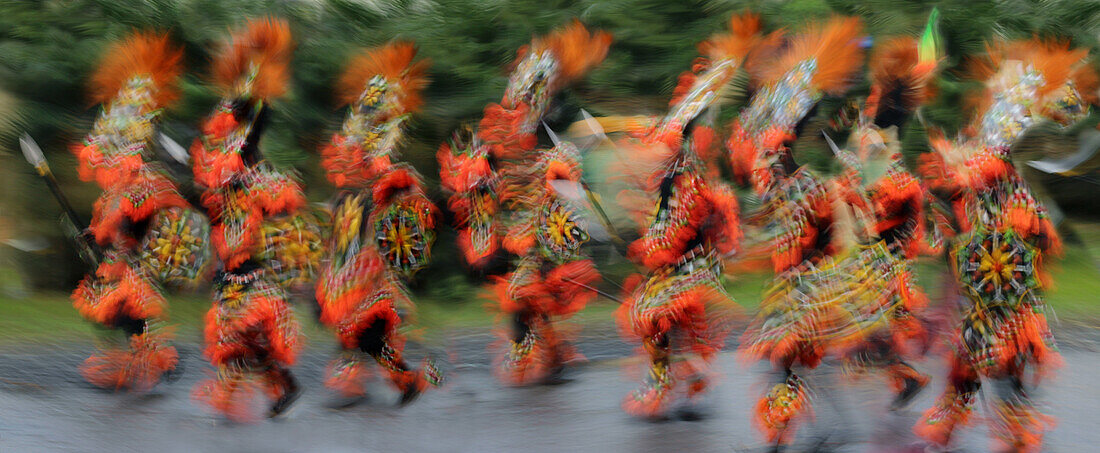 Dancers in motion wearing rtaditional costumes, Atiatihan Festival, Kalibo Aklan, Panay Island, Philippines, Asia
