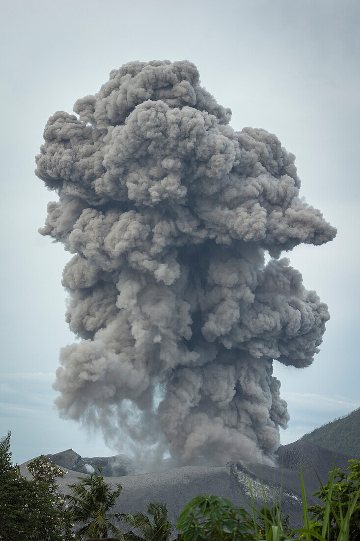 Close up of an ash cloud rising kilometers high after an eruption of the active volcano on Tavurvur Matupi Iceland, Papua New Guinea, New Britain, South Pacific