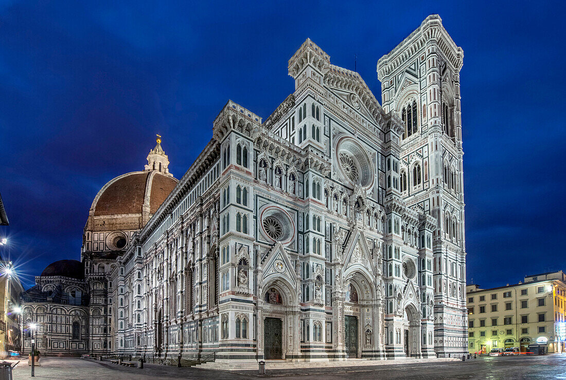 Low angle view of Basilica di Santa Maria del Fiore illuminated at night, Florence, Tuscany, Italy