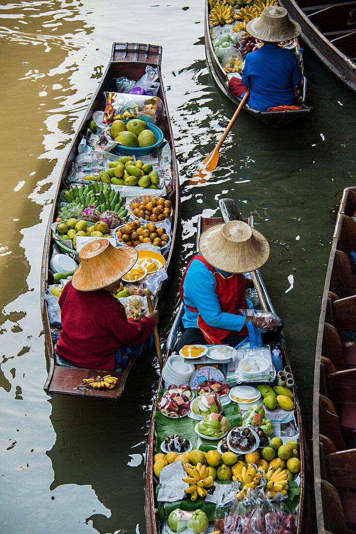 High angle view of merchants selling fruit in canoes