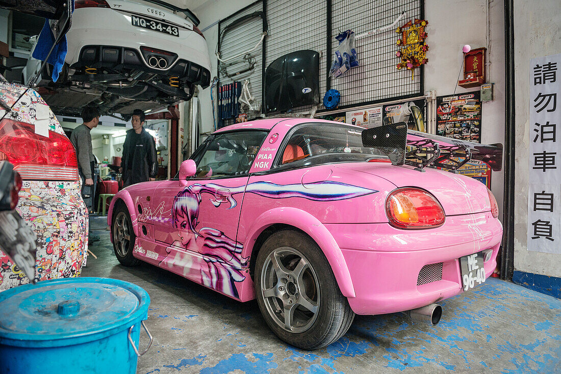 tuning workshop with feminine corny pink car, Macao, China, Asia