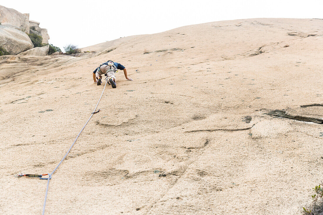 Sport climbing near Xiamen, rock climbing, young man, climbing area Nantaiwu, granite rock, Xiamen, Fujian, China, Asia