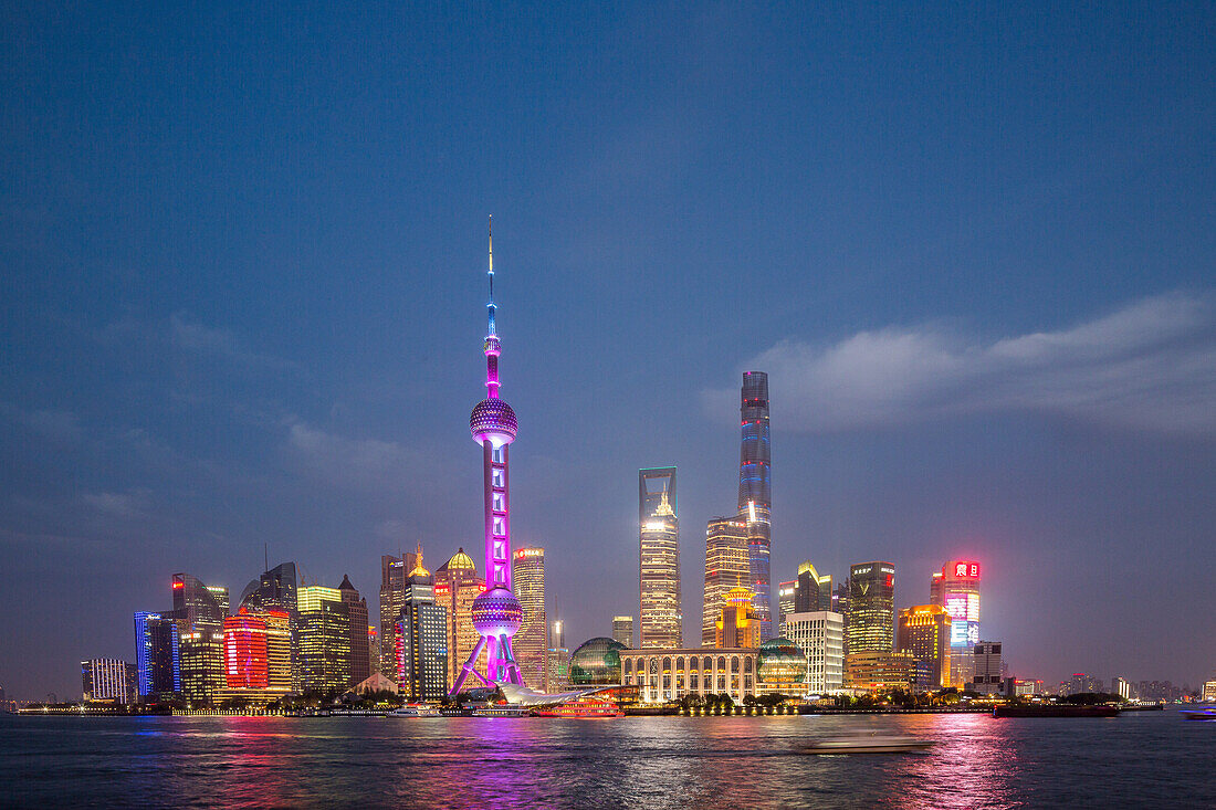 futuristic Pudong skyline in background, Oriental Pearl Tower,  Shanghai Tower, Jin Mao Tower, evening, city lights, Shanghai, China, Asia