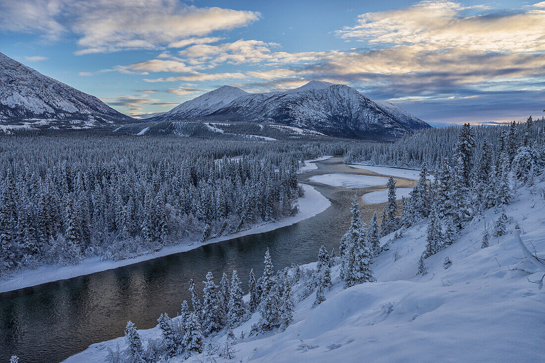 Winter late afternoon light over the Takini River and the mountains in the Southern Yukon, Yukon, Canada