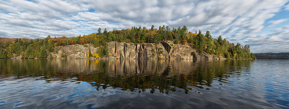 Panoramic view of the cliffs in Rock Lake in autumn, Algonquin Park, Ontario, Canada