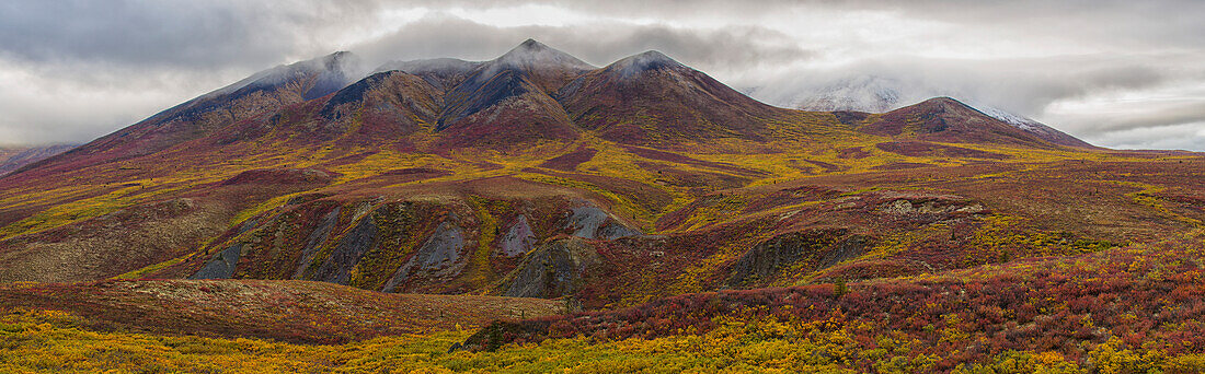 The multi-coloured hills and mountains along the Dempster Highway, near Dawson City, Yukon, Canada