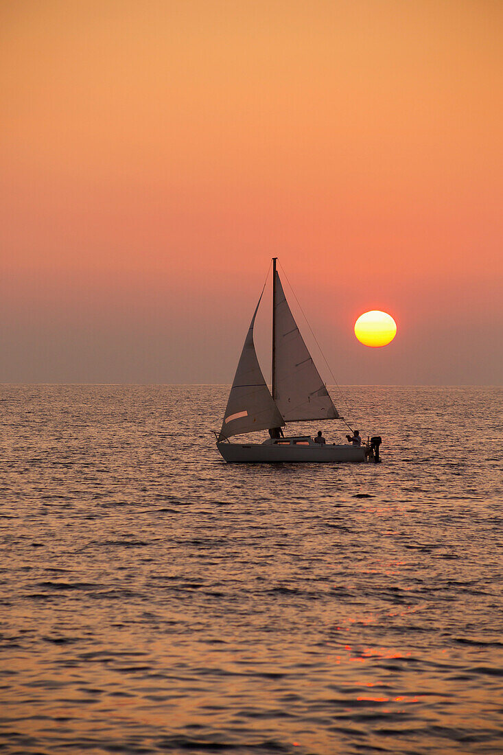 Sailboat sailing at sunset, Wailea, Maui, Hawaii, United States of America