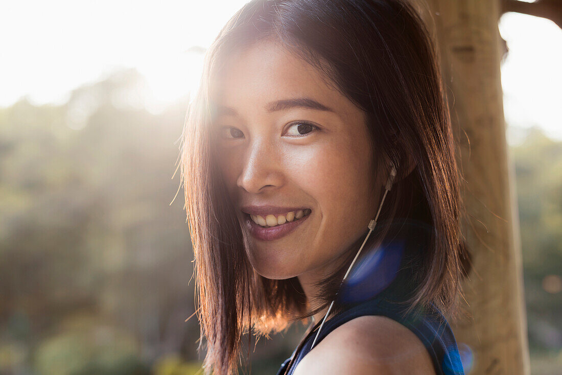 Portrait of a Chinese girl listening to music, Xiamen, Fujian province, China