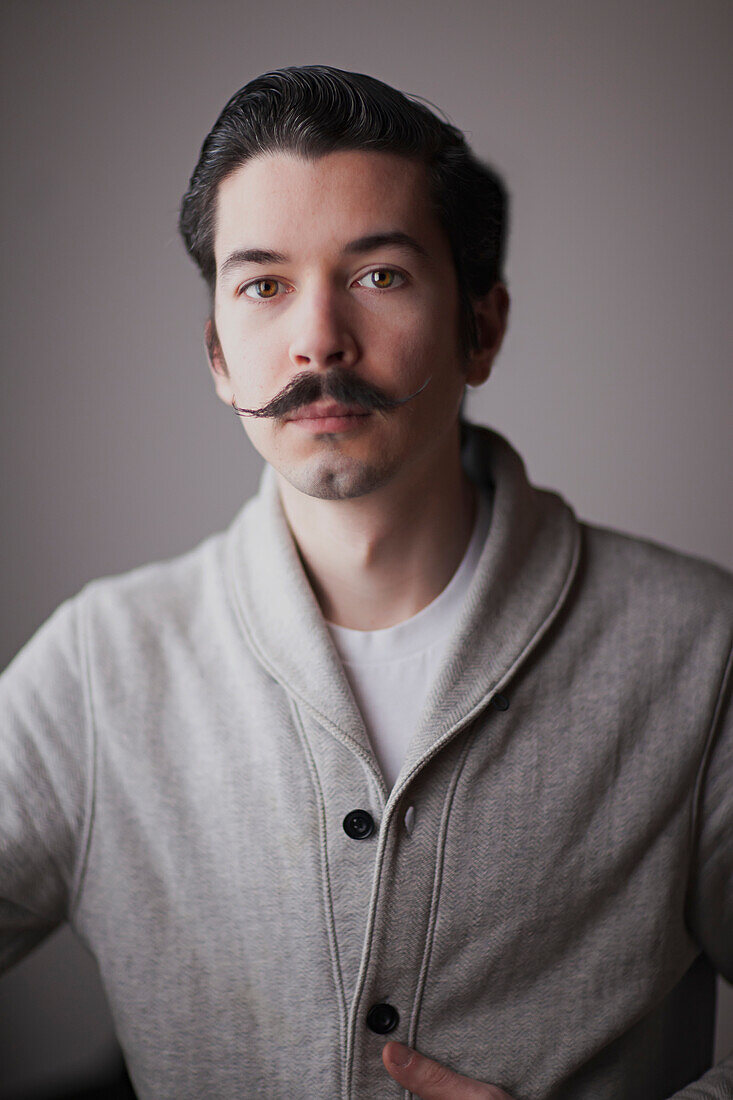 Portrait of a young man with a moustache, Regina, Saskatchewan, Canada