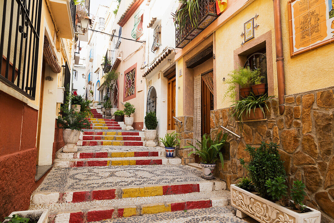 Colourful steps between residential buildings, Altea, Spain