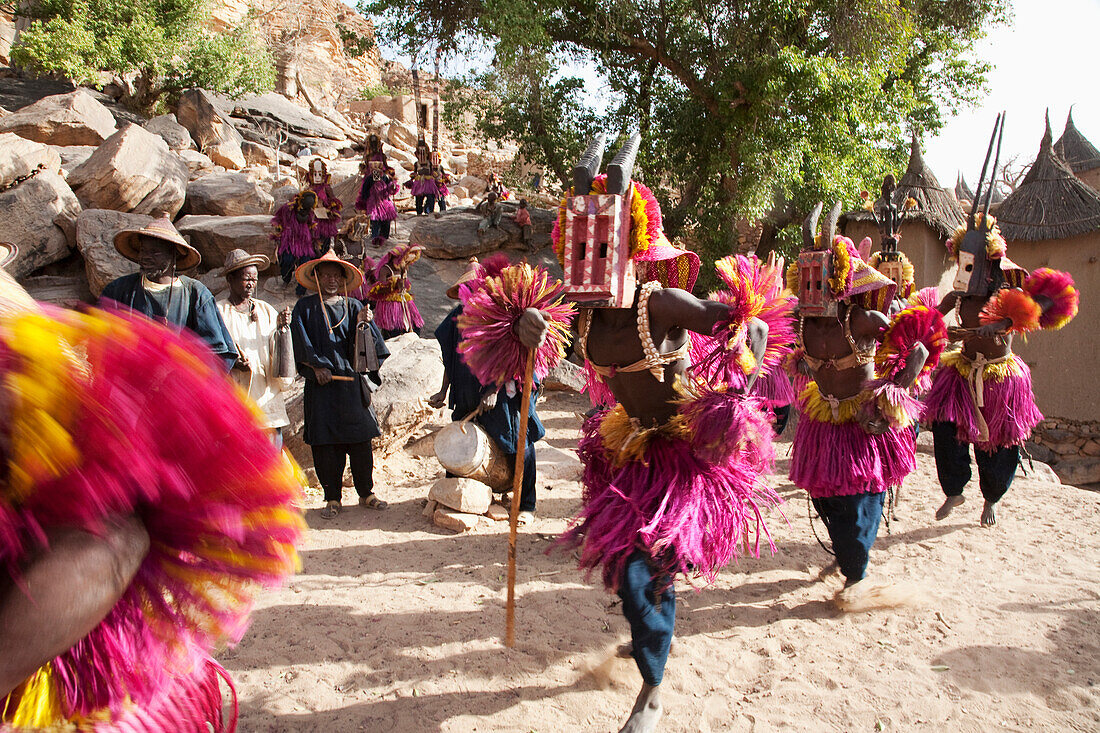 Dancers wearing Kananga masks perform at the Dama celebration in Tireli, Mali