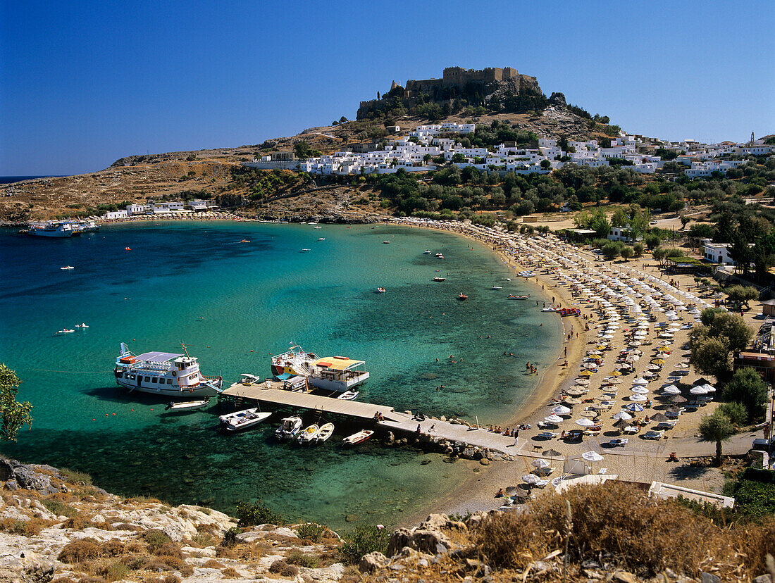 View over beach and castle, Lindos, Rhodes Island, Dodecanese Islands, Greek Islands, Greece, Europe