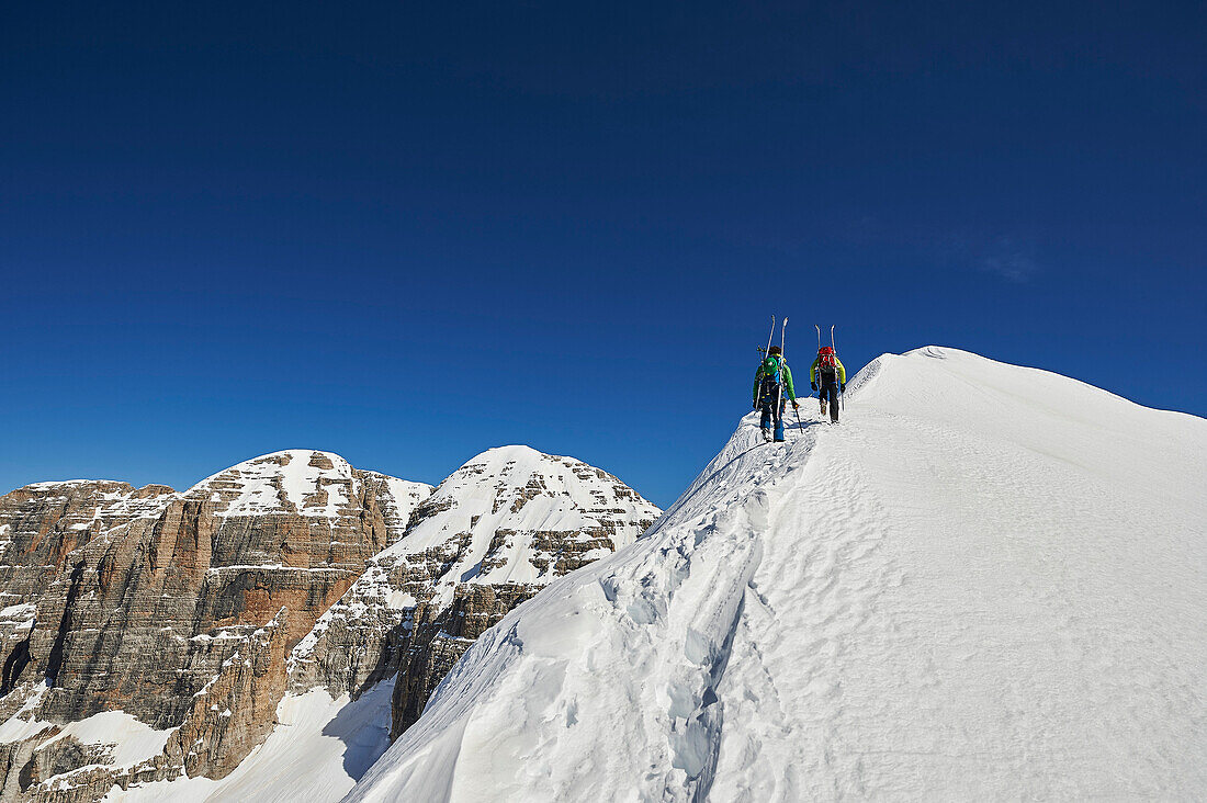 Two Men skitouring on the ridge to Cima d´Agola in the Area of the Brenta Dolomites Madonna di Campiglio, Skitour, Brenta Gebirge, Dolomites, Trentino, Italien