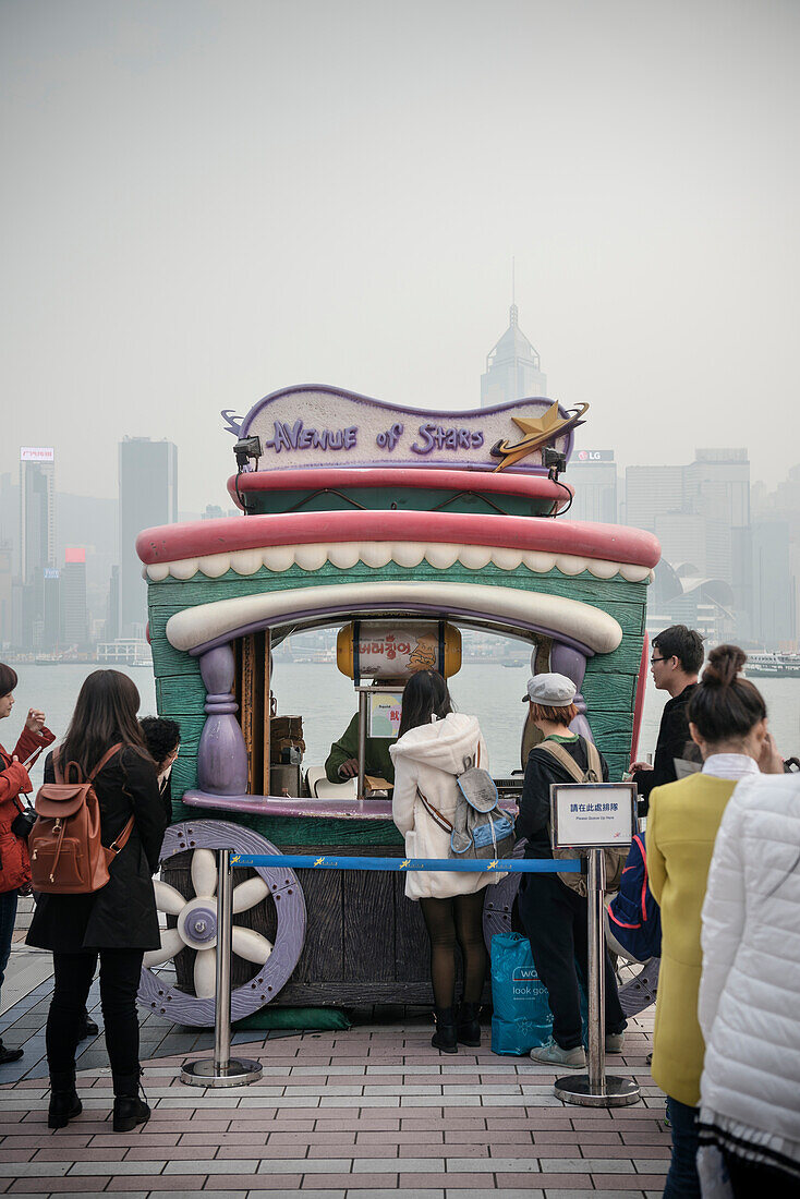 tourists in front of food truck at Avenue of Stars, Kowloon, Hongkong, China, Asia