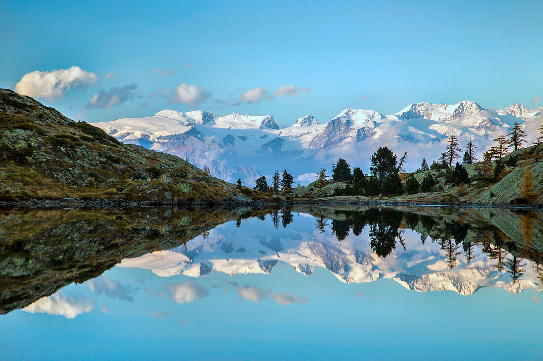 Sunrise on Mount Rosa seen from Lac Blanc, Natural Park of Mont Avic, Aosta Valley, Graian Alps, Italy, Europe