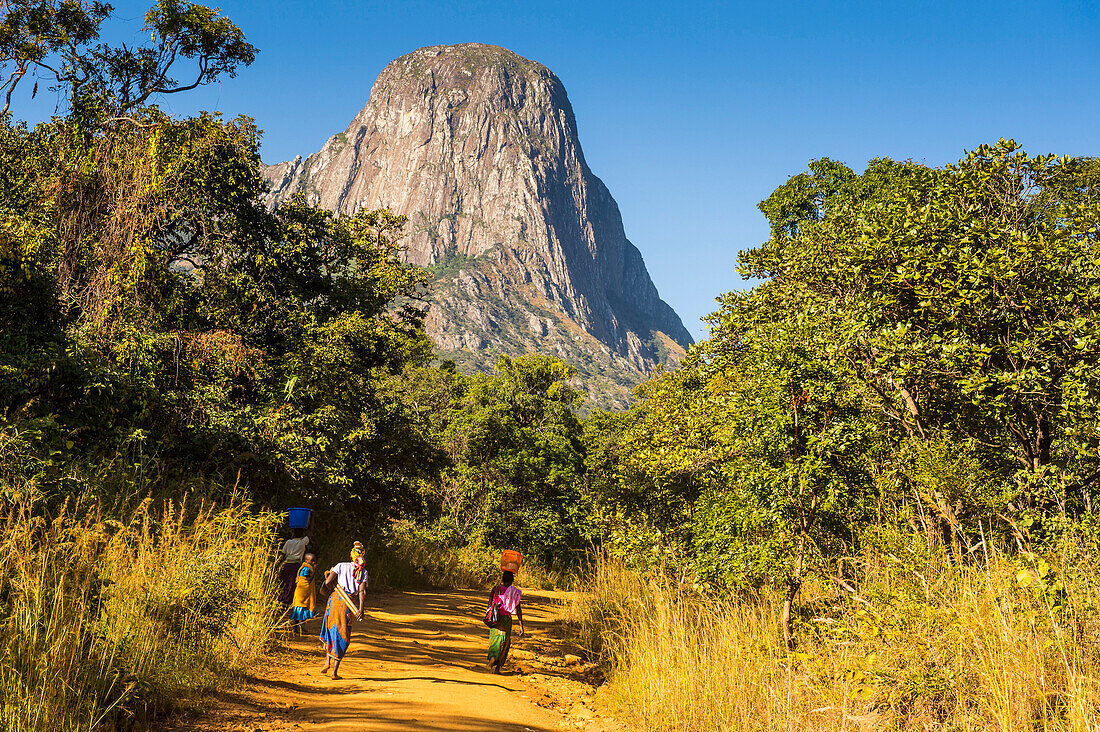 Dusty track laeding to the granite peaks of Mount Mulanje, Malawi, Africa