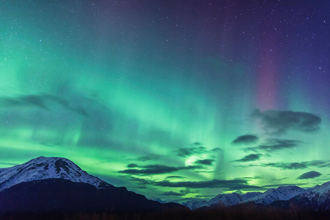 Northern Lights above the Chugach Mountains South of Girdwood, Southcentral Alaska, USA.