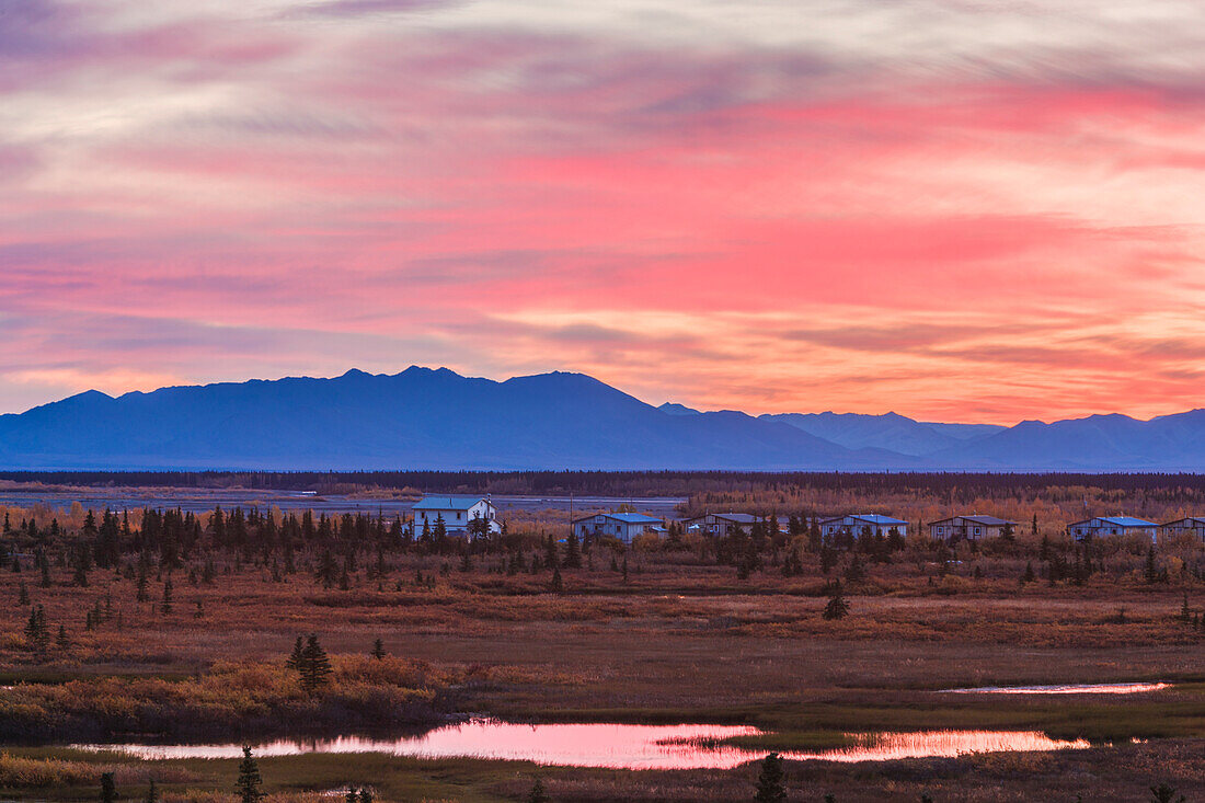 Scenic view of the village of Noatak with the Baird Mountains in the distance at sunrise, Arctic Alaska, USA, Autumn
