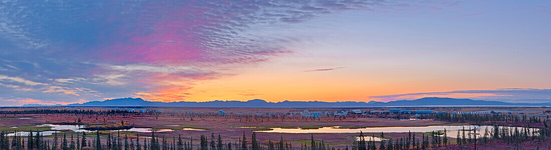 Scenic sunset over the village of Noatak, Baird Mountains, tundra, and wetlands, Arctic Alaska, Autumn