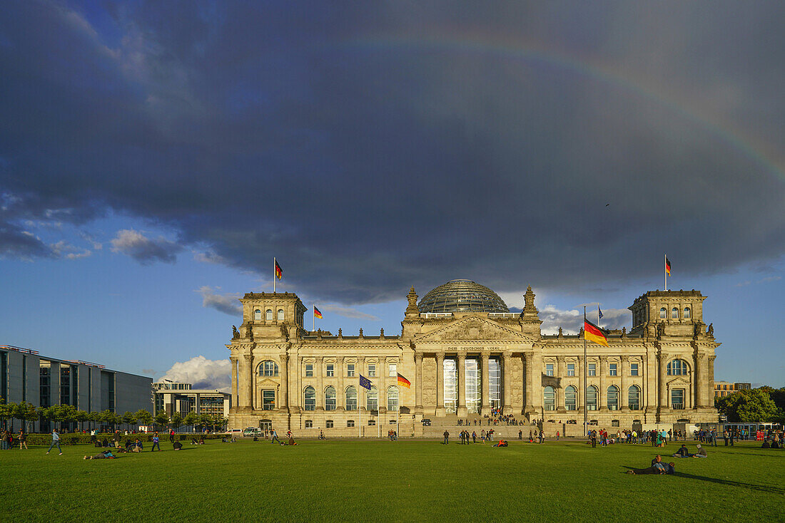 Rainbow and storm clouds above the Reichstag building, Berlin, Germany