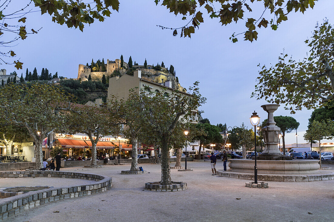 Boules in a square near the harbour, Fortress in the background, Cassis, Cote d Azur, France