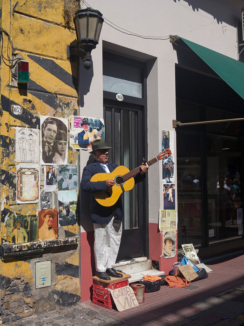 Tango musician in the streets of the old barrio of San Telmo, Buenos Aires, Argentina, South America