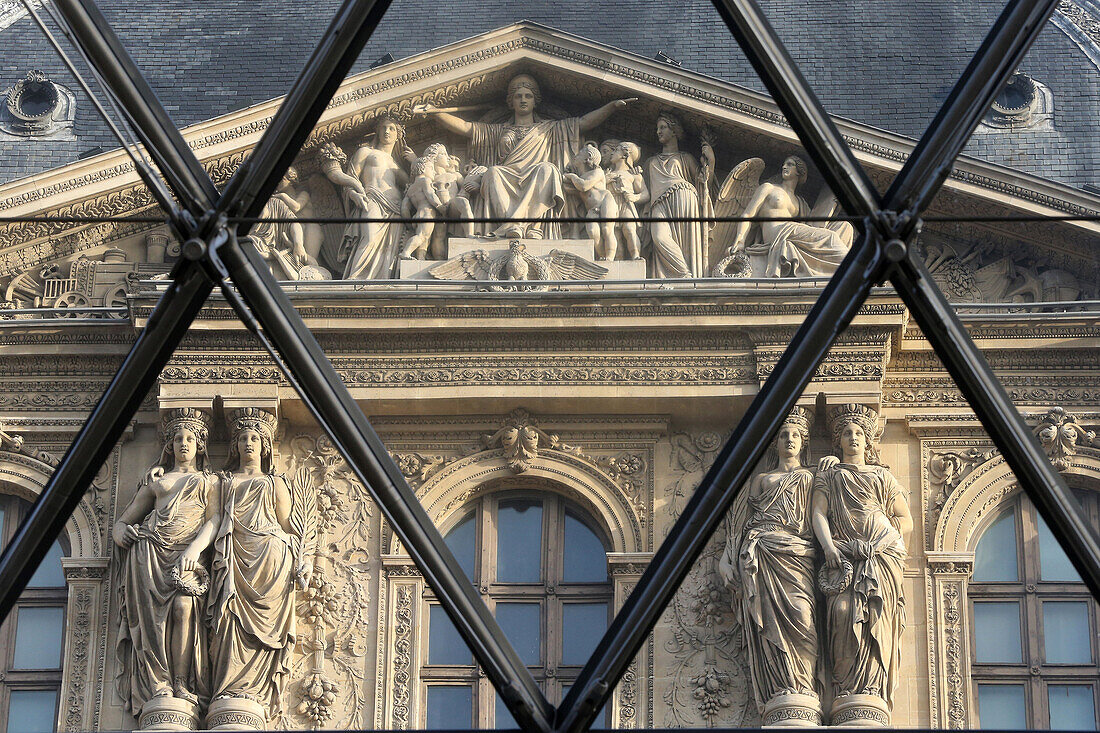 Palais du Louvre seen through the Pyramid, Paris, France, Europe