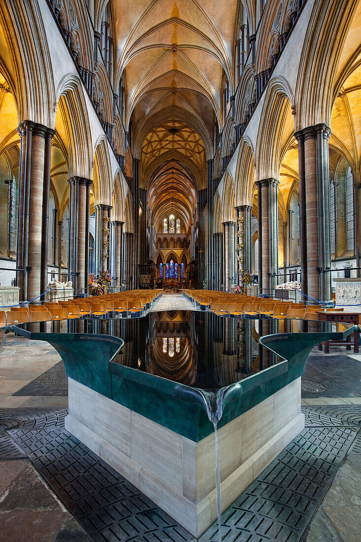 Looking down the nave and across the font in Salisbury Cathedral, Salisbury, Wiltshire, England, United Kingdom, Europe
