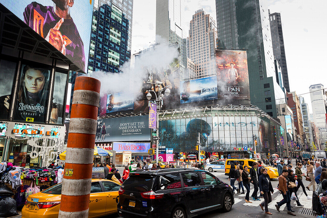 Times Square with steam pipe, yellow cab, traffic and tourists, Manhattan, New York City, USA, America