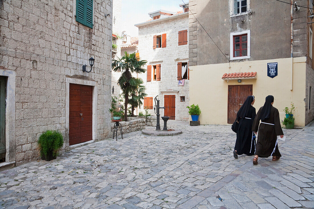 Nuns Walking Through The Streets Of Kotor, Montenegro
