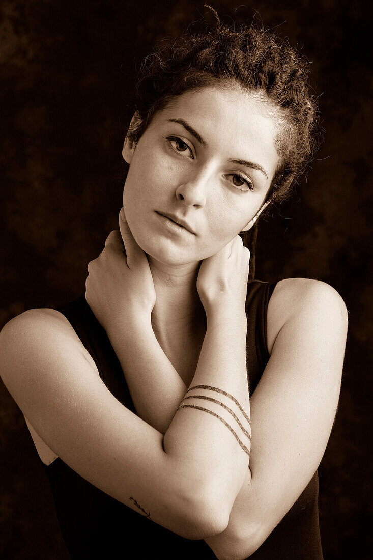 Close up of serious woman with dreadlocks