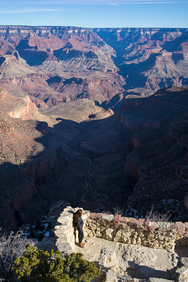Caucasian woman admiring Grand Canyon, Arizona, United States