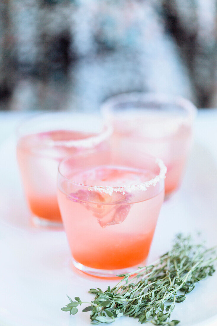 Close up of cocktails and fresh herbs