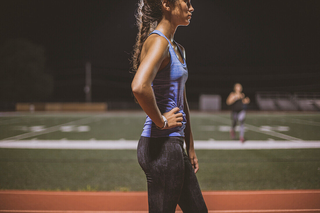 Athlete resting on sports field