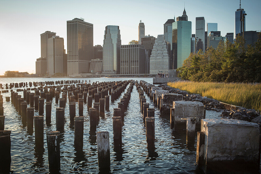 Wooden posts at waterfront, New York, United States