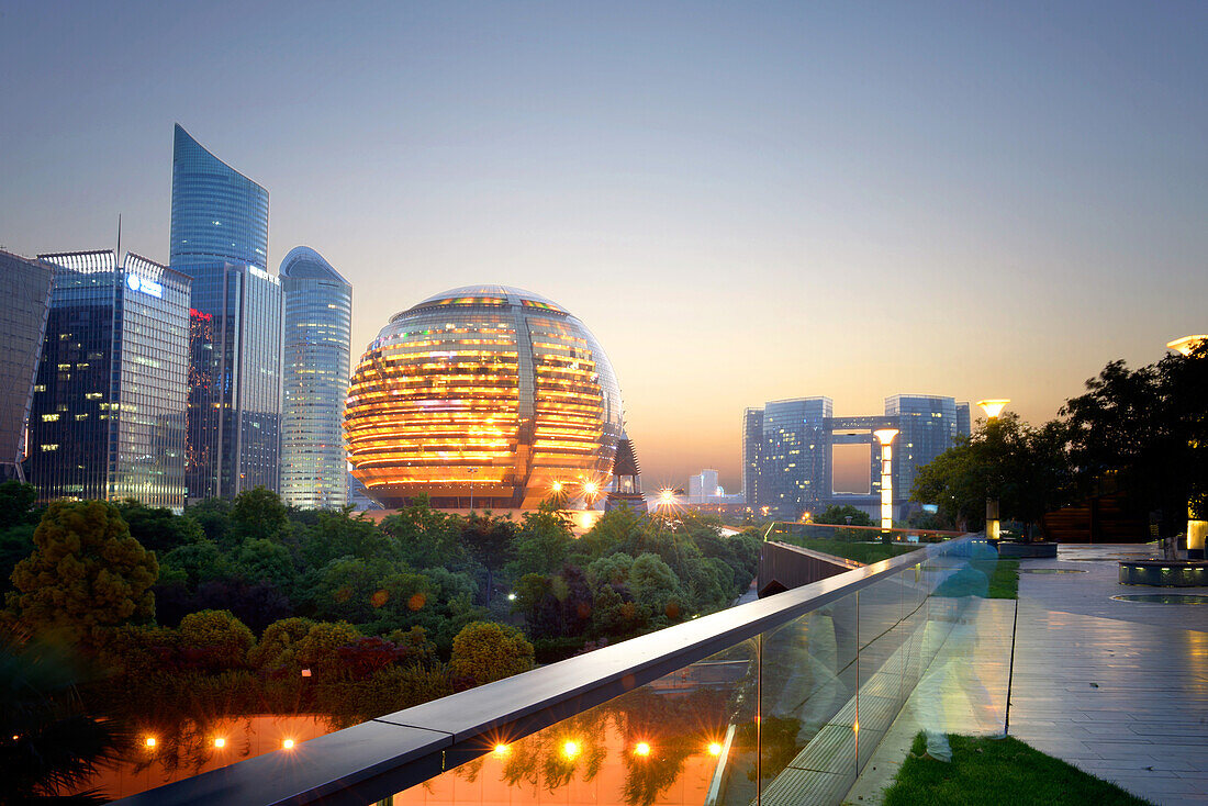 Jianggan district continues to fascinate with modern skyscrapers and sphere-shaped architecture of Hangzhou InterContinental, Hangzhou, Zhejiang, China, Asia