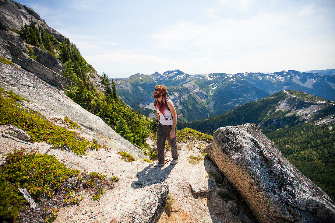 Evan Howard, a climber and explorer, hikes toward Needle Peak in British Columbia, Canada.