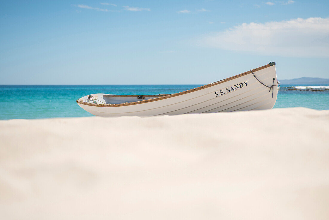 A rowboat on the beach at Bahia de Los Sueños in Baja California Sur, Mexico.