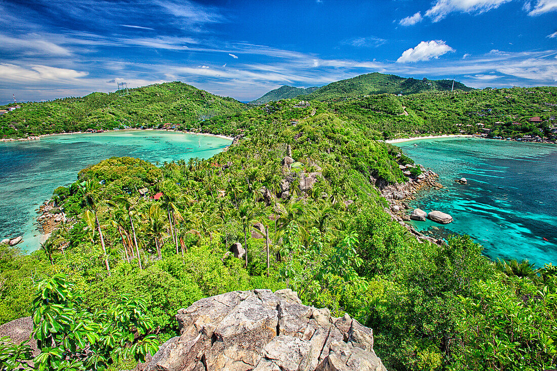 John Suwan Viewpoint Koh Tao.   From this point on the southern tip of the island, you can see all the way to the hilly north. It presents a wonderful photo opportunity to capture the spectacular scenery and the shallow coral reef through the crystal clea