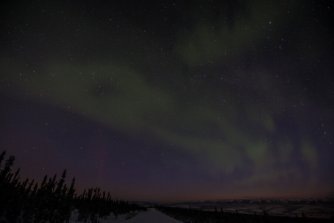 northern lights aurora borealis at Eagle Plains Lodge at the Dempster highway, Yukon, Yukon territory, Canada