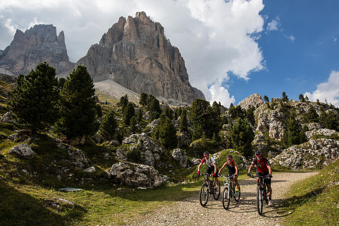 Mountain bikers at Langkofel, Trentino South Tyrol, Italy