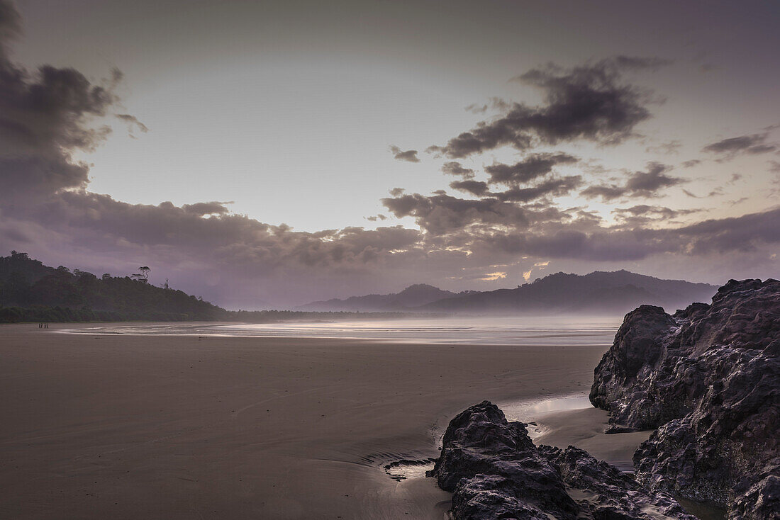 Deserted dream beach in a bay just before sunrise - Indonesia, Java