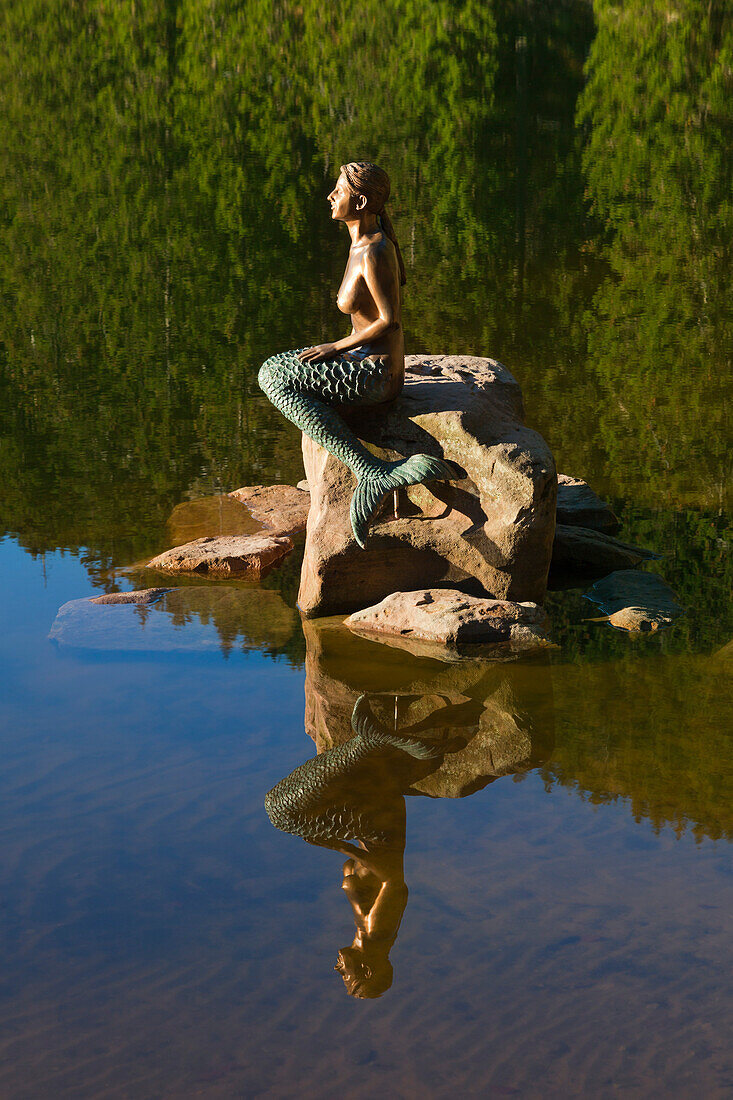 Mermaid sculpture at lake Mummelsee, Black Forest, Baden-Wuerttemberg, Germany