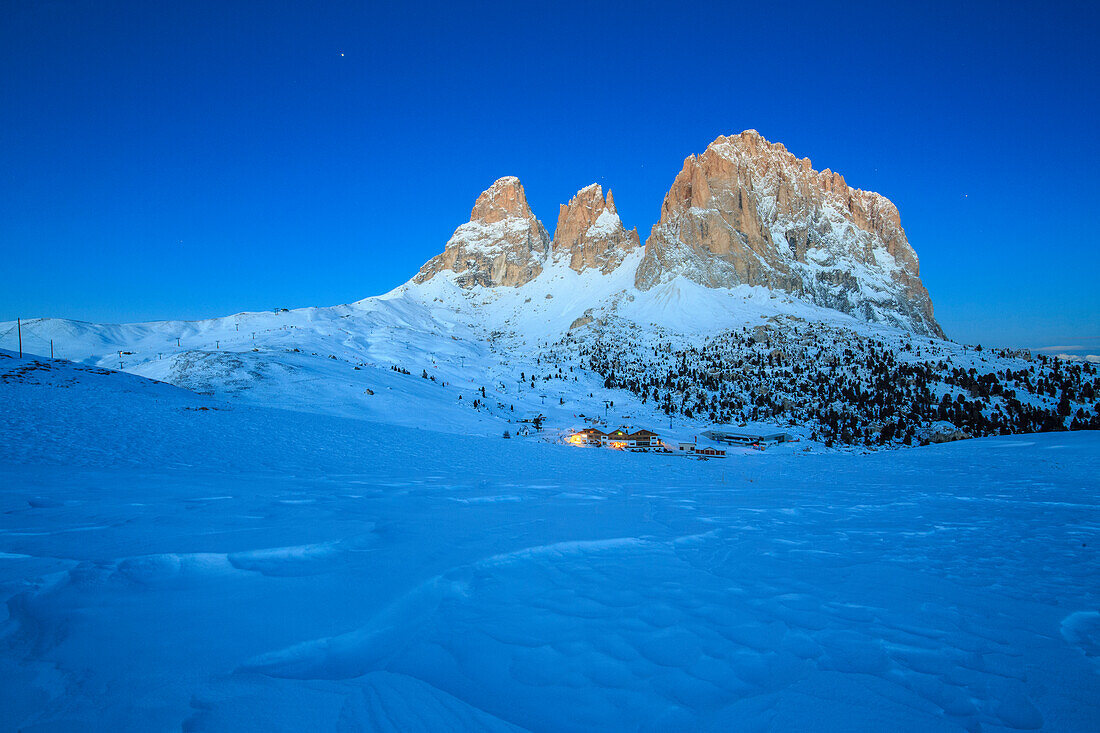 The blue dusk on Sassopiatto and Sassolungo, Fassa Valley, Sella Pass, Trentino-Alto Adige, Dolomites, Italy, Europe