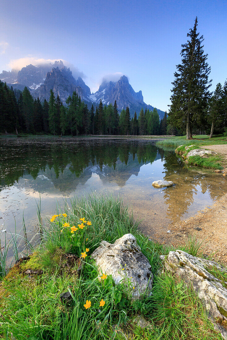 Cadini di Misurina group reflected in Lake Antorno at sunrise, Auronzo of Cadore, Veneto Sesto Dolomites, Italy, Europe