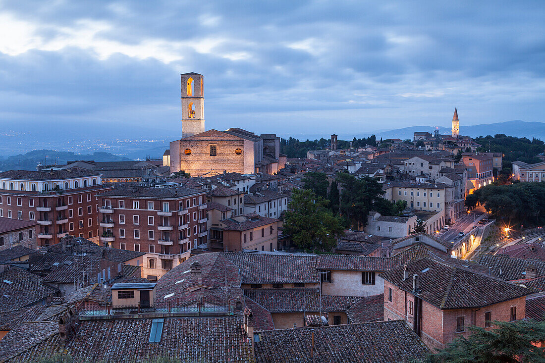 The rooftops of Perugia with the Basilica di San Pietro and Basilica di San Domencio in the background, Perugia, Umbria, Italy, Europe