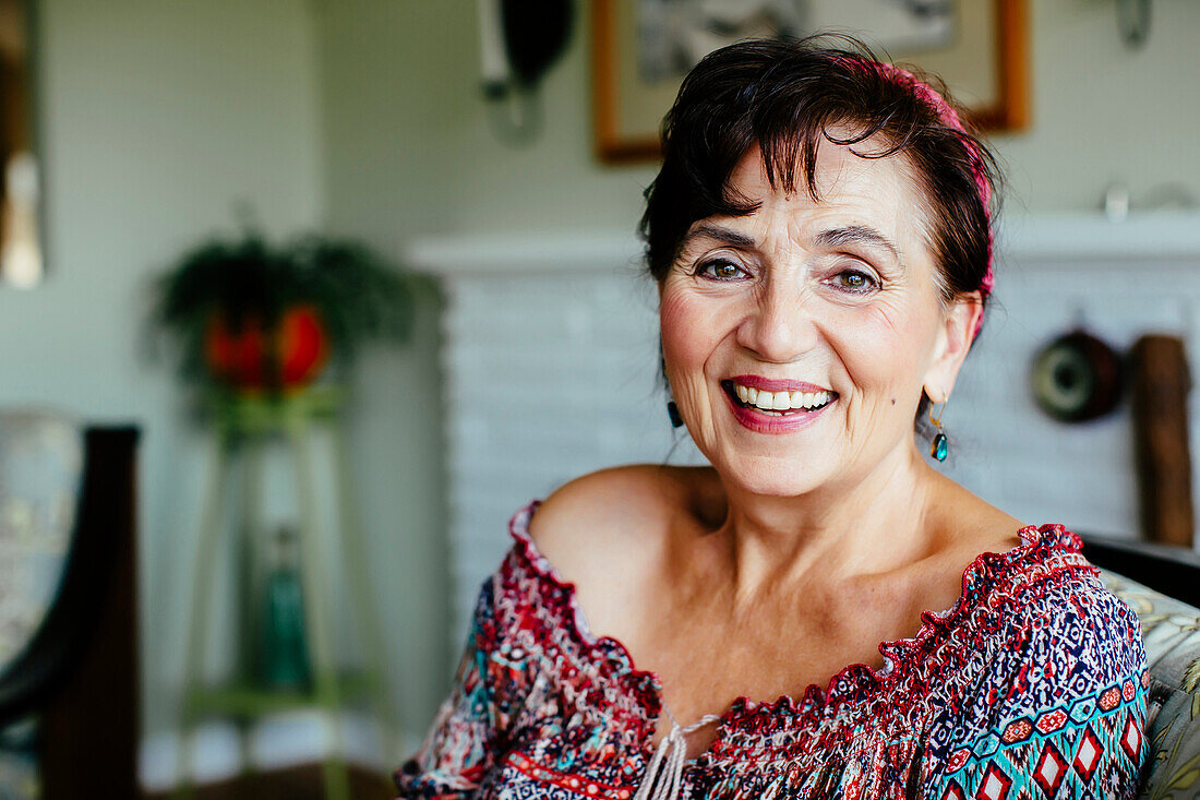 Caucasian woman smiling indoors