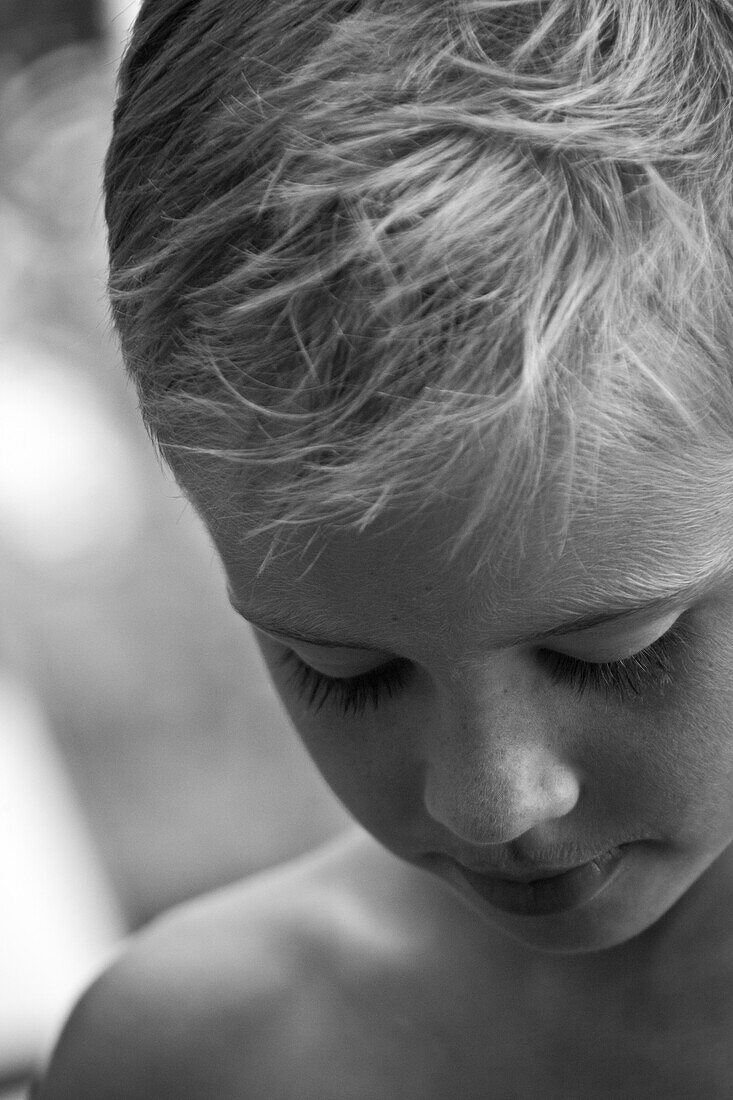 Young Boy Looking Down