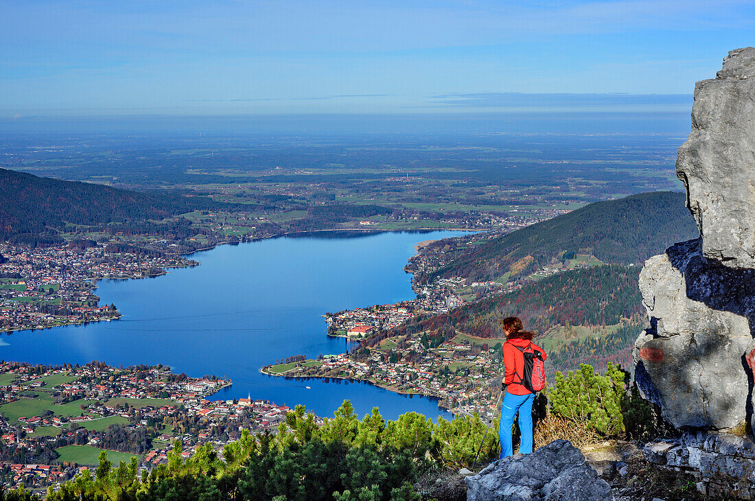 Woman looking towards lake Tegernsee, view from Wallberg, Wallberg, Bavarian Alps, Upper Bavaria, Bavaria, Germany